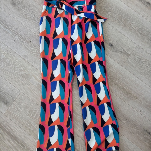 Never Fully Dresses abstract print flare pants with acrylic flower buckle - Picture 2 of 5